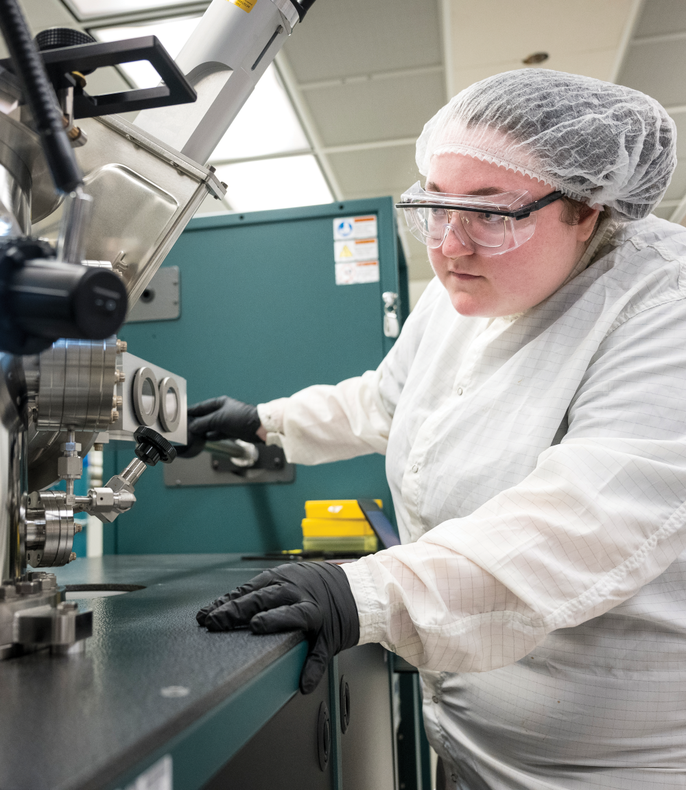 Osu engineer in protective gear using equipment